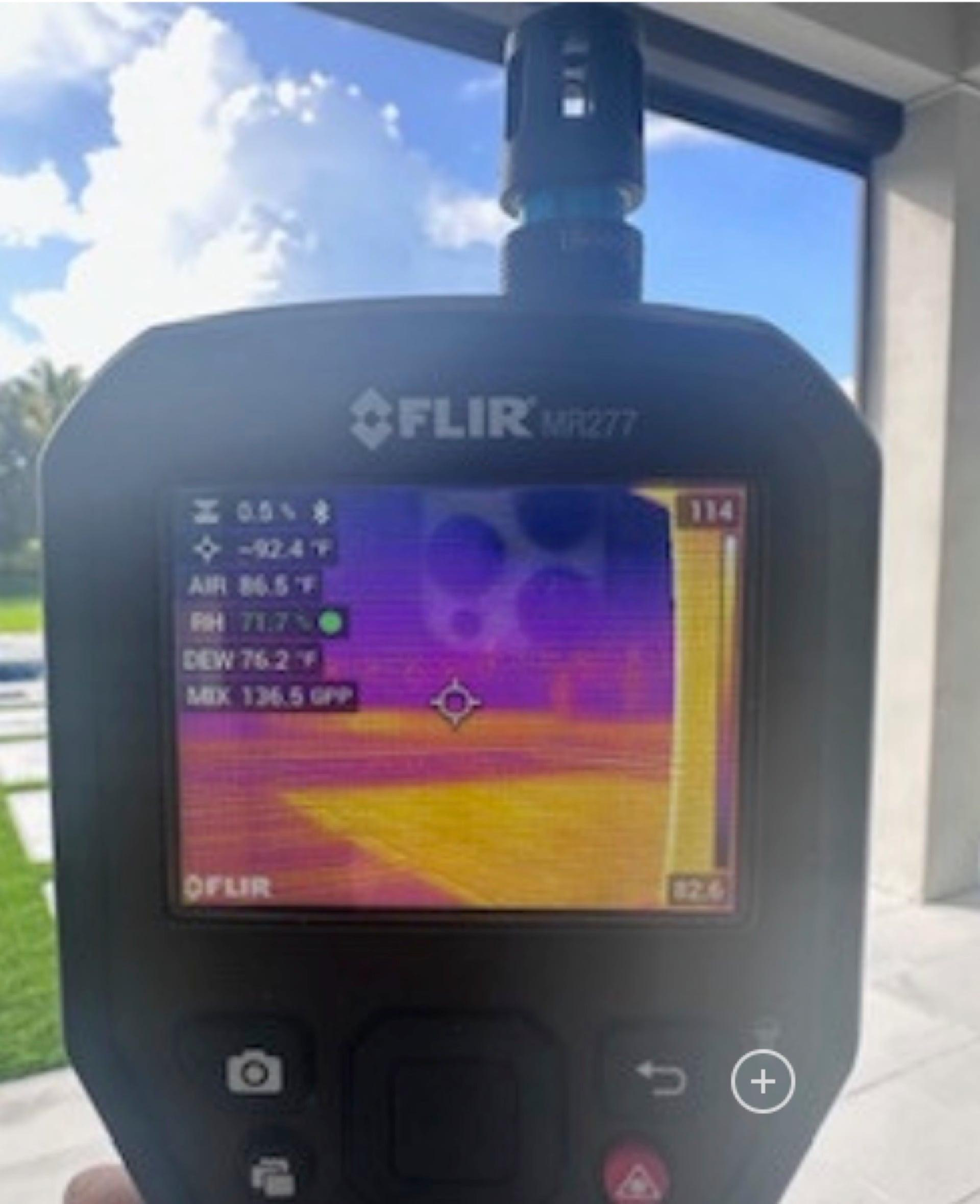 FLIR thermal imaging camera showing surface temperature variations